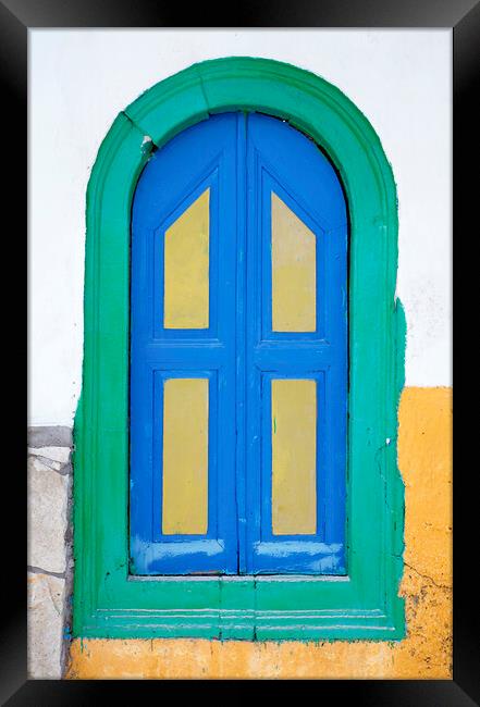 Colorful old wooden window shutter, Corfu, Greece Framed Print by Neil Overy