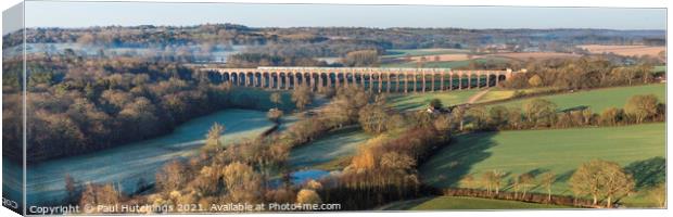 Viaduct with green train Canvas Print by Paul Hutchings