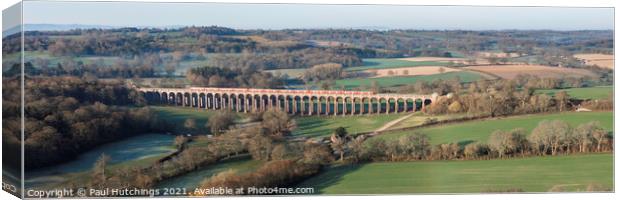 Red train at Ouse valley Viaduct Canvas Print by Paul Hutchings