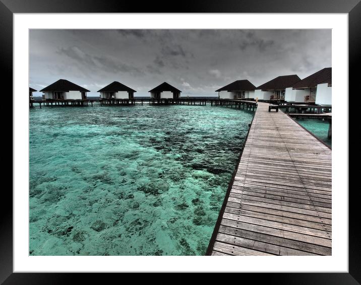 Water bungalows in Maldives Framed Mounted Print by mark humpage