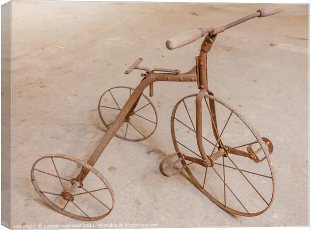 an old children's tricycle 1930 Canvas Print by daniele mattioda