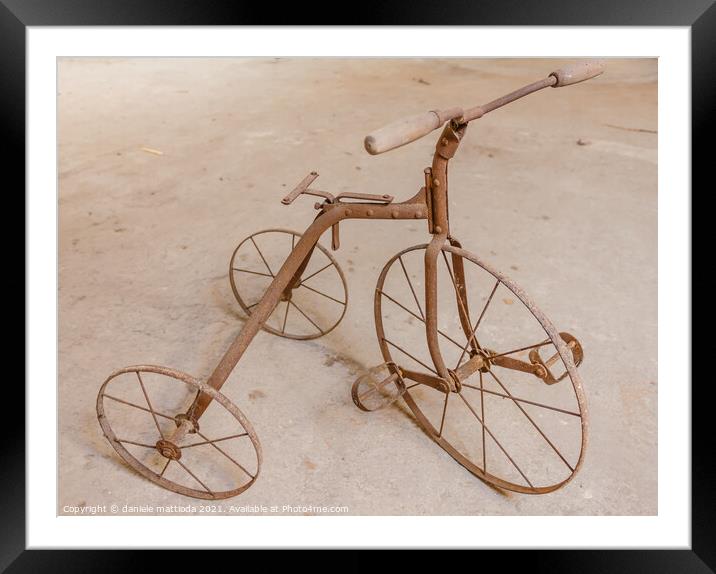 an old children's tricycle 1930 Framed Mounted Print by daniele mattioda