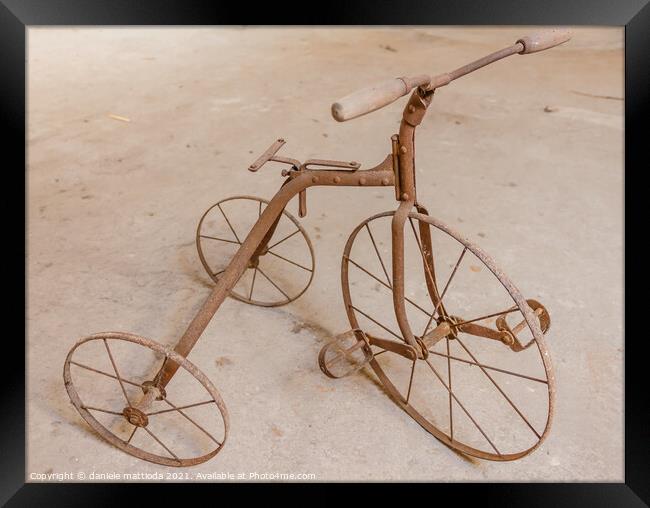 an old children's tricycle 1930 Framed Print by daniele mattioda