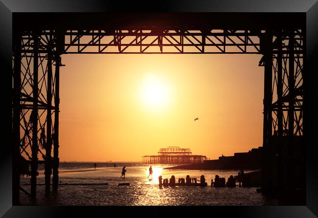 Brighton Pier Sunset Framed Print by Neil Overy