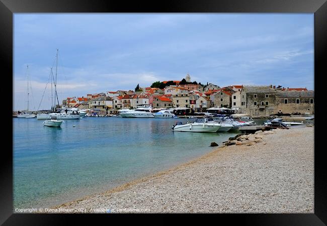 Primosten Beach Croatia with view of the old town Framed Print by Diana Mower
