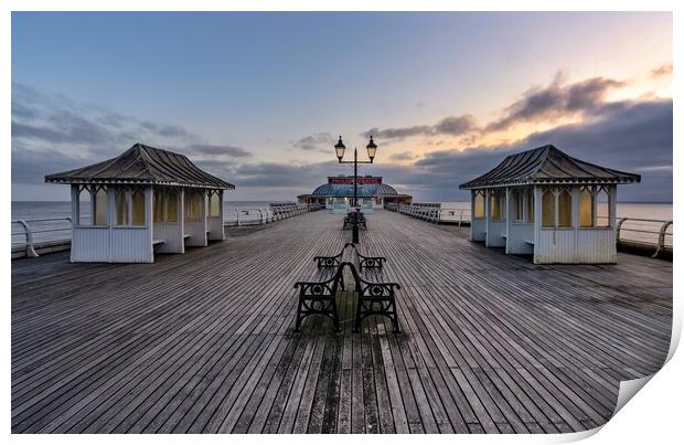 Looking out to sea across Cromer pier Print by Gary Pearson