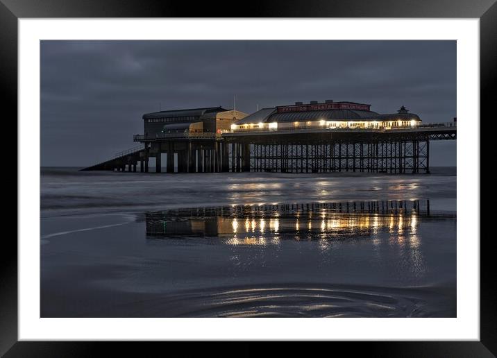 Reflections of the end of the pier at Cromer Framed Mounted Print by Gary Pearson