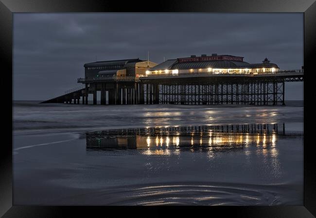 Reflections of the end of the pier at Cromer Framed Print by Gary Pearson