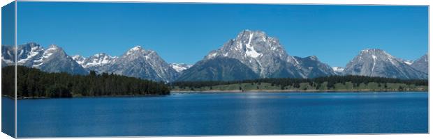 The Grand Tetons and Jenny Lake Panoramic Canvas Print by Adrian Beese