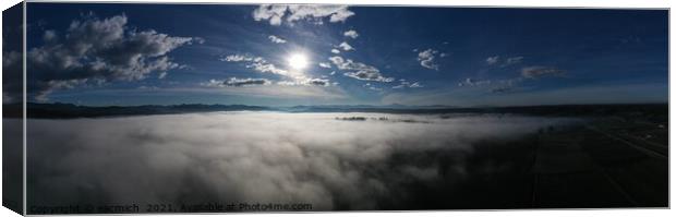 Above the clouds Canvas Print by eacmich 