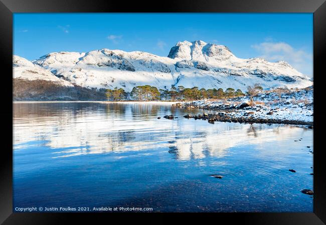 Slioch reflected in the waters of Loch Maree Framed Print by Justin Foulkes