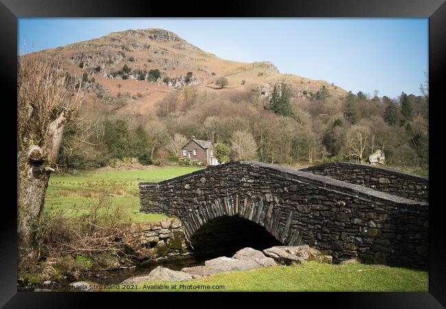 Helm Crag beyond New Bridge Framed Print by Michaela Strickland