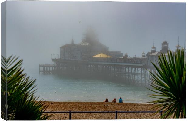 Misty Morning At Eastbourne Pier Canvas Print by Chris Lord