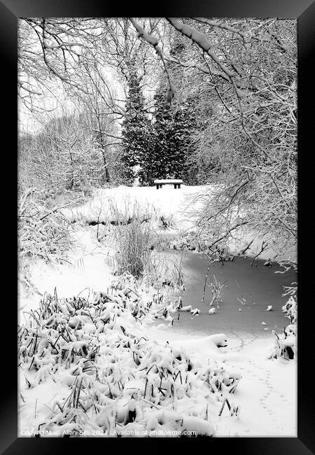 Snow covered Seat Winter Park Framed Print by Allan Bell
