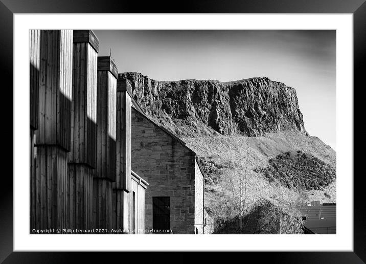 Sailsbury Crags in Edinburgh Scotland photographed from just off the Royal Mile Framed Mounted Print by Philip Leonard