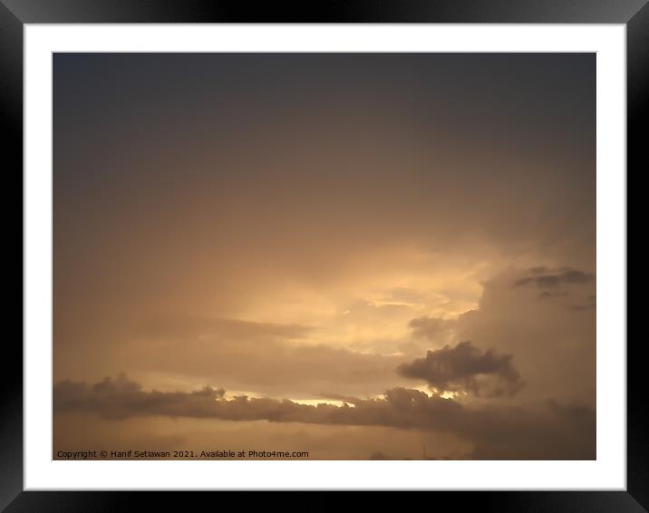 Brown golden cloudscape with cloud shapes. Framed Mounted Print by Hanif Setiawan