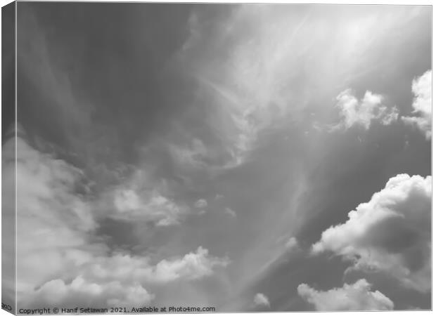 Fluffy cloud shape cloudscape in black and white. Canvas Print by Hanif Setiawan