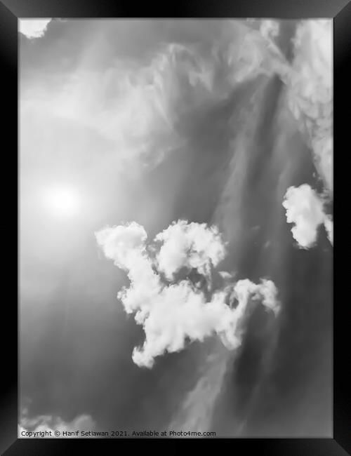 Fluffy cloud shape cloudscape in black and white. Framed Print by Hanif Setiawan