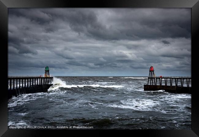 Twin Whitby piers on a stormy seas 474 Framed Print by PHILIP CHALK