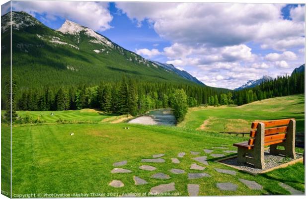 Lush green view of the golf ground in Banff National Park.  Canvas Print by PhotOvation-Akshay Thaker