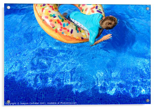 6-year-old boy bathing in a transparent pool playing with a larg Acrylic by Joaquin Corbalan