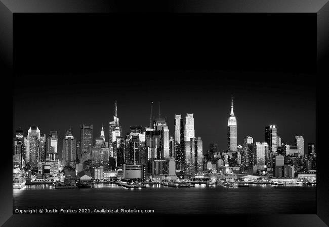 West Side skyline at night, New York  Framed Print by Justin Foulkes