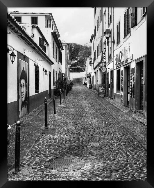 Funchal Back Street in Monochrome Framed Print by Diana Mower