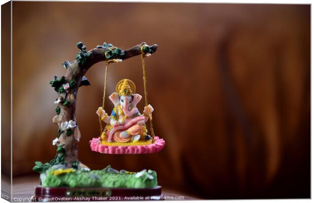 Hindu God-Ganesha in art form sitting on a swing.  Canvas Print by PhotOvation-Akshay Thaker