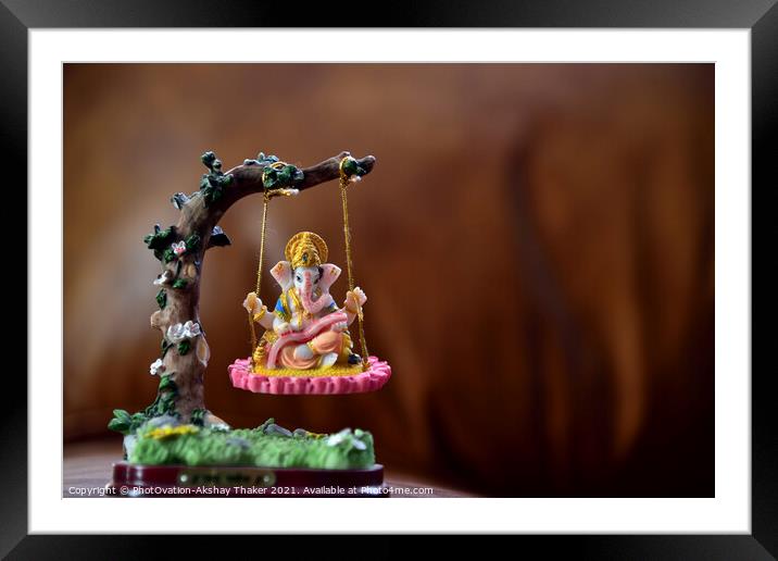 Hindu God-Ganesha in art form sitting on a swing.  Framed Mounted Print by PhotOvation-Akshay Thaker