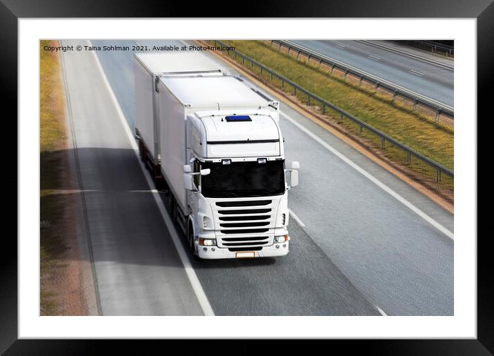 White Refrigerated Freight Truck at Speed Framed Mounted Print by Taina Sohlman