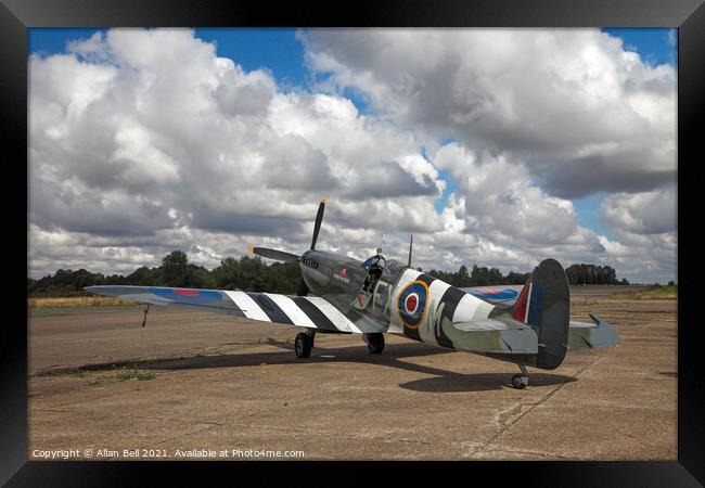 Spitfire with D-Day markings Framed Print by Allan Bell