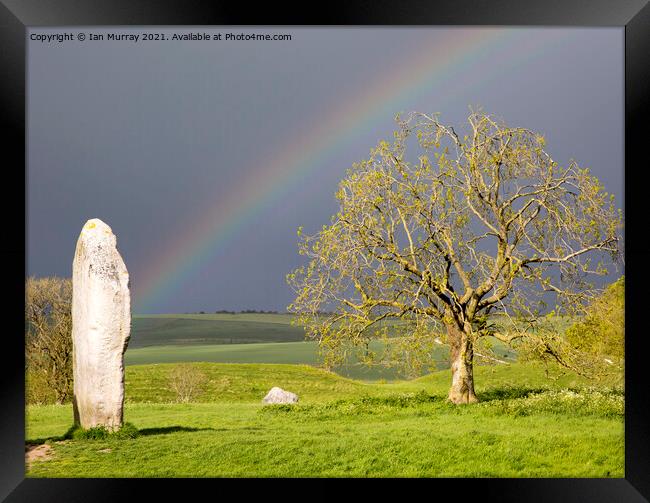 Rainbow at Avebury Framed Print by Ian Murray