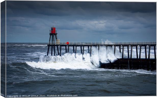 crashing waves on Whitby pier on the Yorkshire east coast 477 Canvas Print by PHILIP CHALK