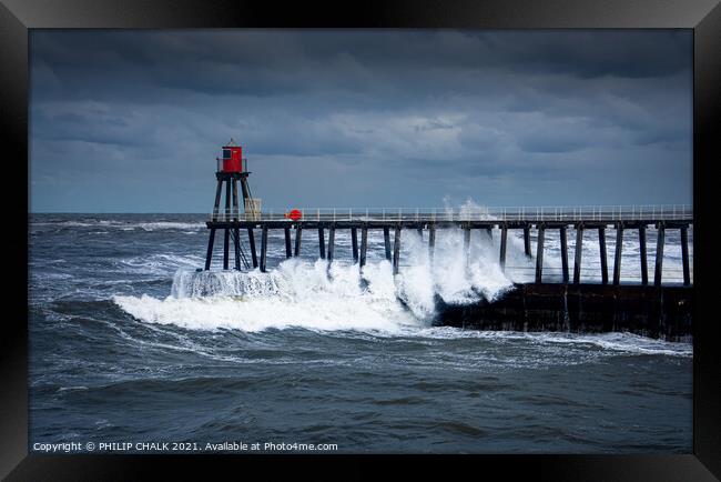 crashing waves on Whitby pier on the Yorkshire east coast 477 Framed Print by PHILIP CHALK