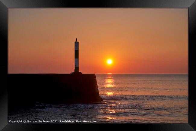 Sunset over Aberystwyth Breakwater and lighthouse Framed Print by Gordon Maclaren