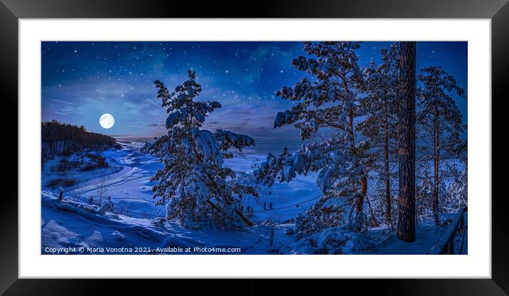 Snowy Baltic sea coast with fir trees in winter ni Framed Mounted Print by Maria Vonotna