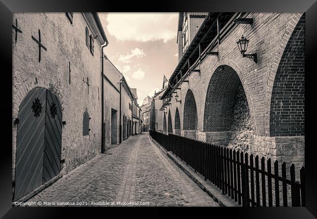 Narrow medieval street in the historic city center Framed Print by Maria Vonotna