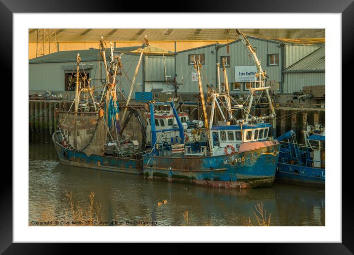 Two fishings boats at low tide Framed Mounted Print by Clive Wells