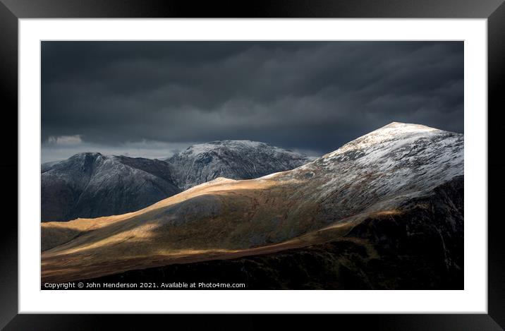Winter on the Carneddau mountains of Snowdonia Framed Mounted Print by John Henderson