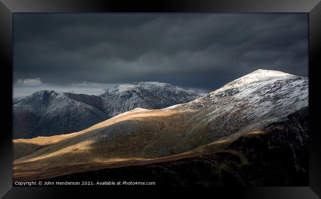 Winter on the Carneddau mountains of Snowdonia Framed Print by John Henderson