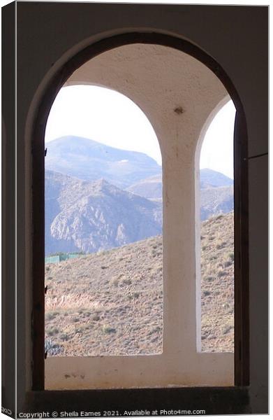 Through the Arches to the Mountains Canvas Print by Sheila Eames