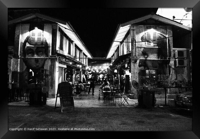 Blurry view into a restaurant and Coffee shop area Framed Print by Hanif Setiawan