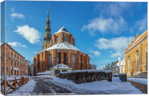 Saint Peter's church against blue sky in winter in Riga, Latvia. Canvas Print by Maria Vonotna