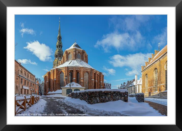 Saint Peter's church against blue sky in winter in Riga, Latvia. Framed Mounted Print by Maria Vonotna