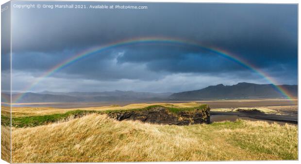 Reynisfjara beach Rainbow Iceland Canvas Print by Greg Marshall