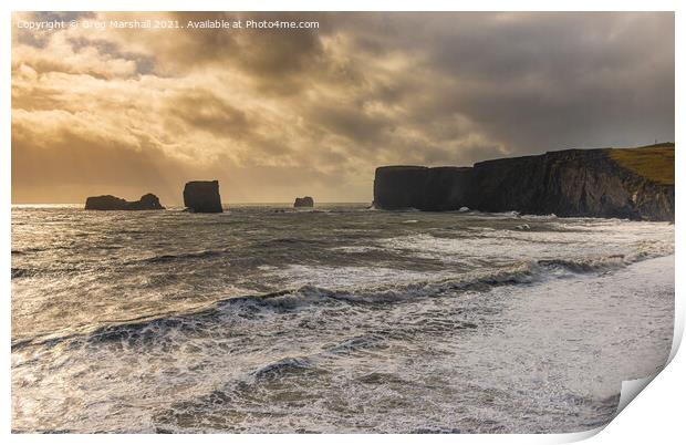 Stormy seas at Dyrhólaey, Iceland Print by Greg Marshall