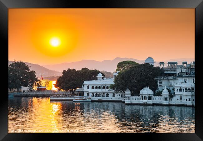 Sunset Pichola lake and Udaipur old town Framed Print by Sanga Park