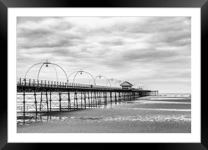 Southport Pier struts out onto the beach Framed Mounted Print by Jason Wells