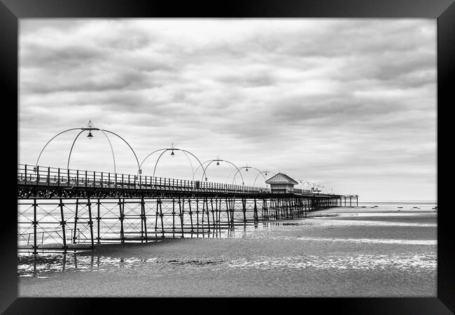 Southport Pier struts out onto the beach Framed Print by Jason Wells