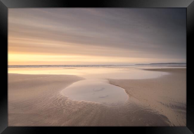 The tranqulity of a beach sunset Framed Print by Tony Twyman